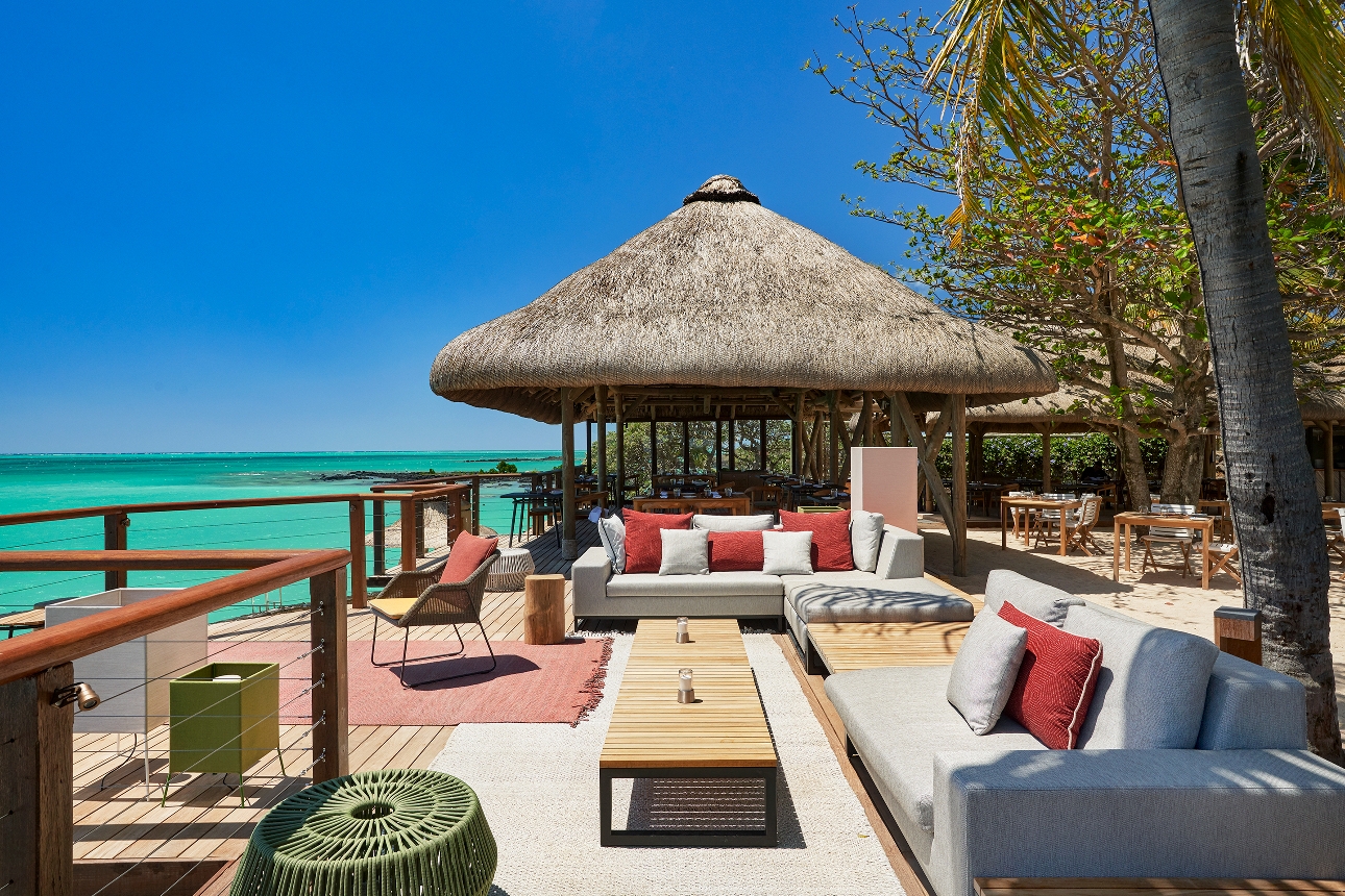 sofas on deck area looking out to sea