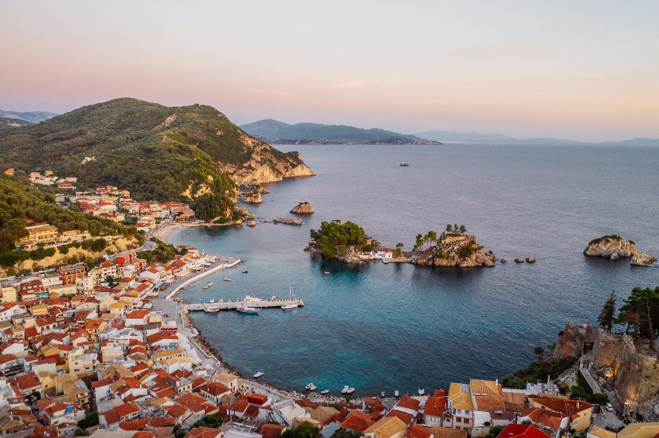 Parga village in sandy cove in hillside 